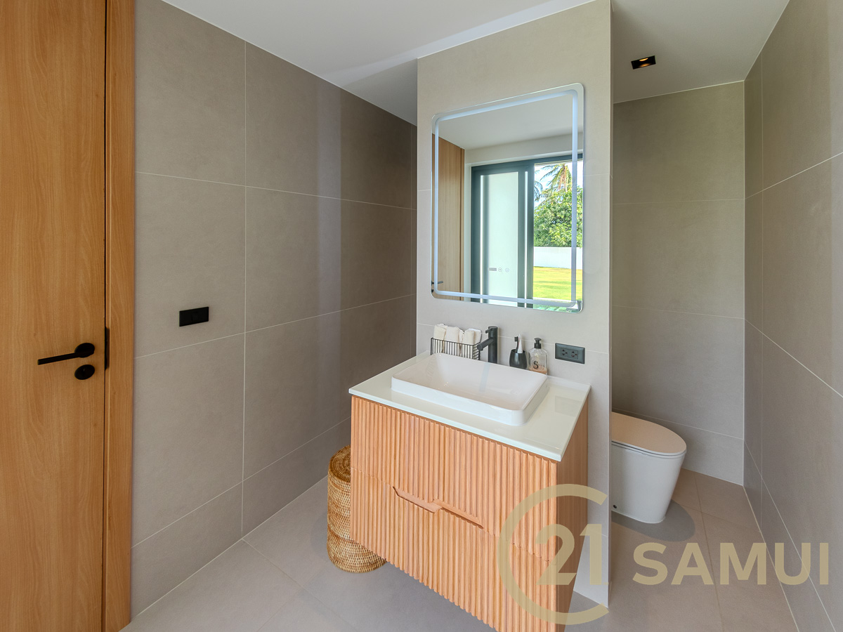 Luxury 4-Bedroom Pool Villa with Guest House and Large Garden for Sale in Plai Laem