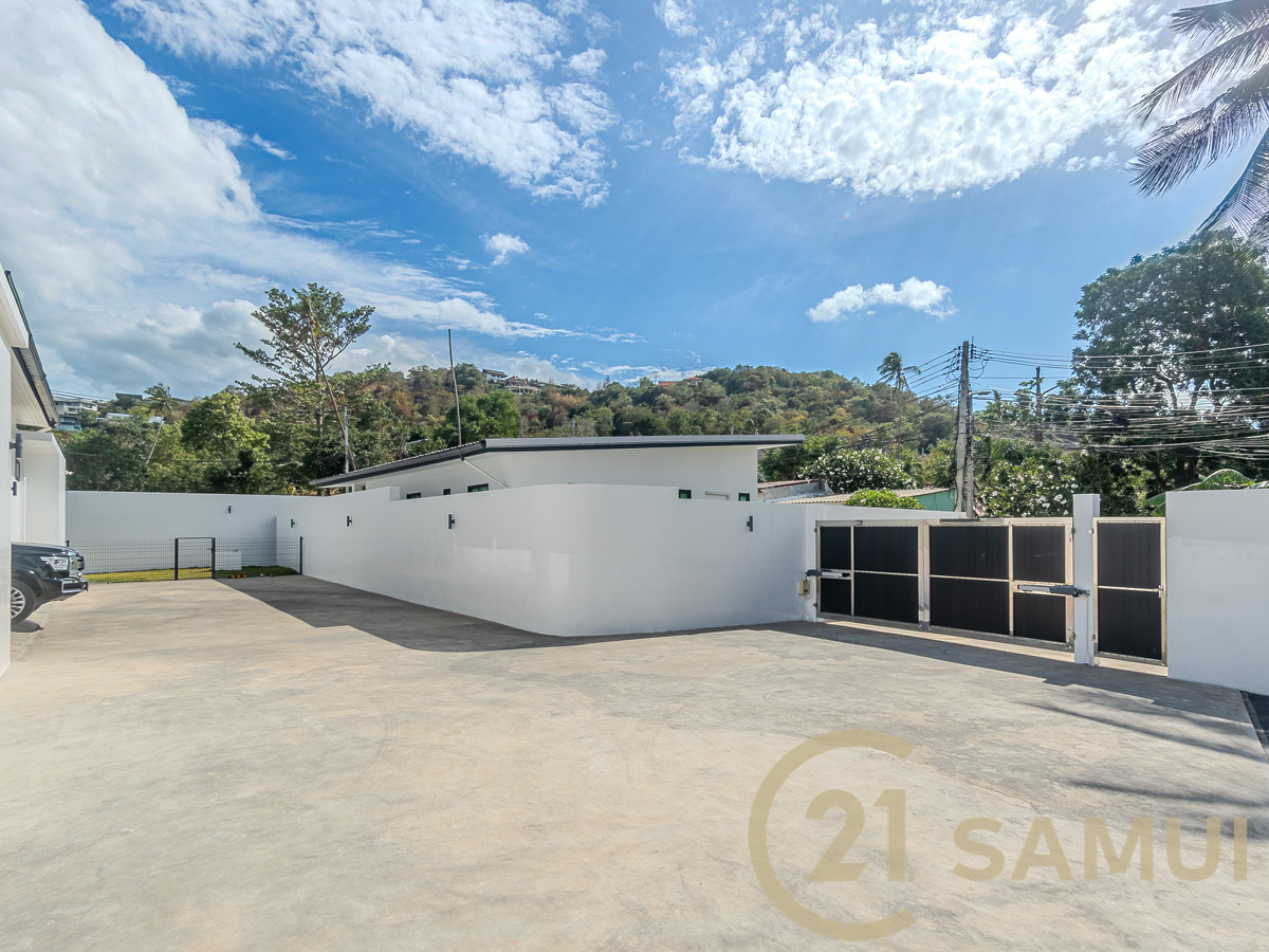 Luxury 4-Bedroom Pool Villa with Guest House and Large Garden for Sale in Plai Laem